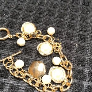 Elegant Gold and White Charm Bracelet